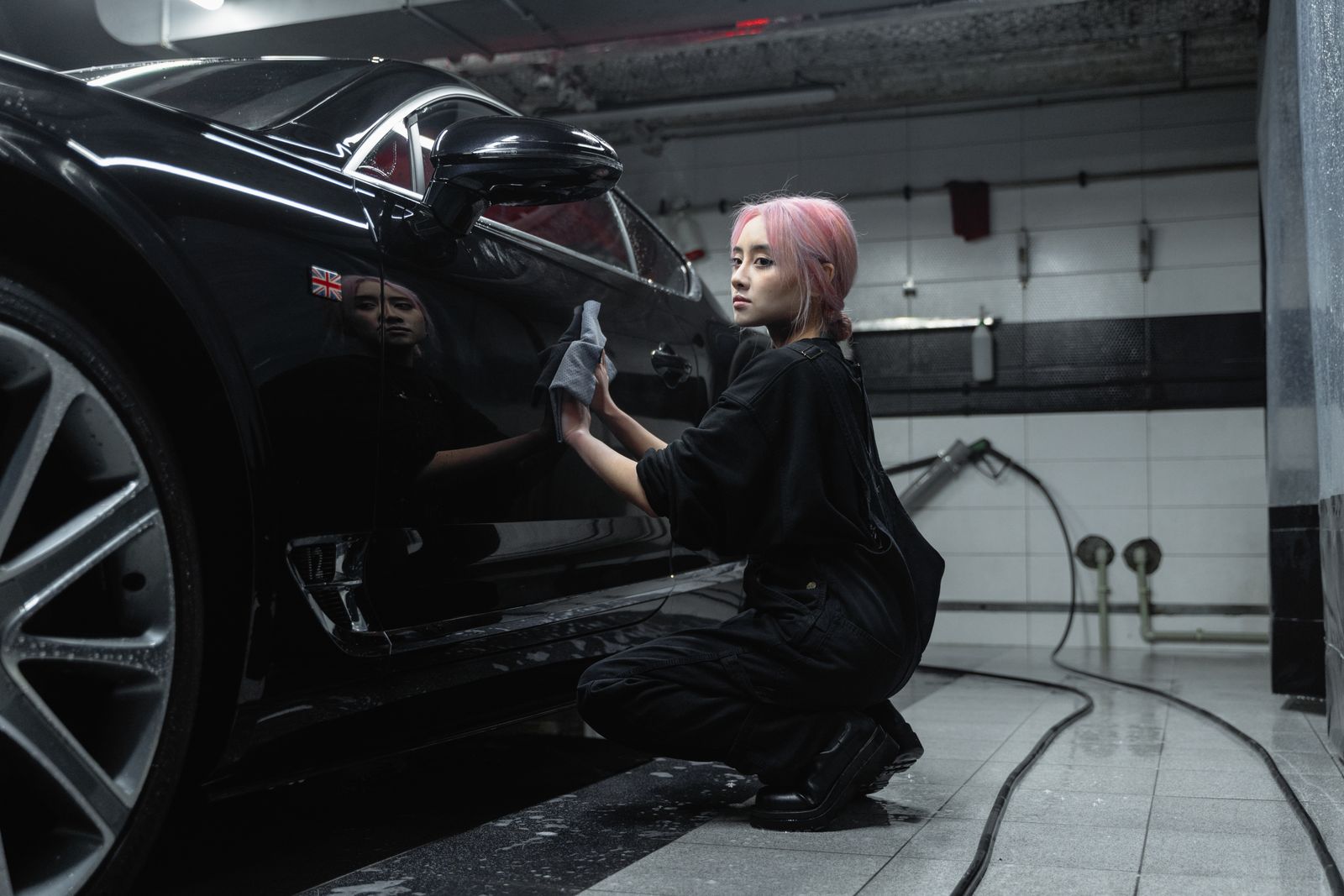 Cleaning wheels and rocker panels by hand